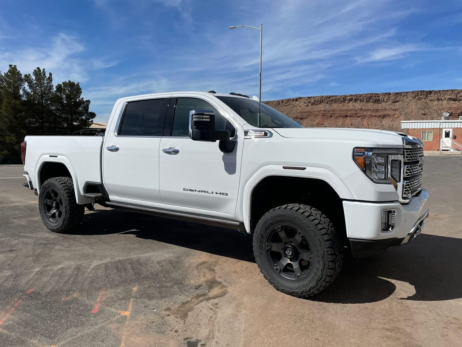 White GMC Denali Lifted - Custom truck build by MST Motorsports in Washington, Utah